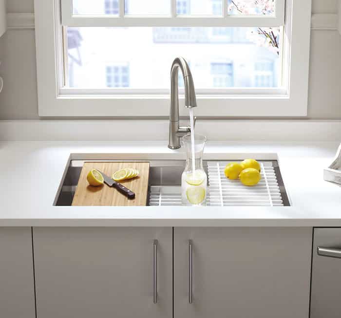 Under mount kitchen sink with cutting board and accessories