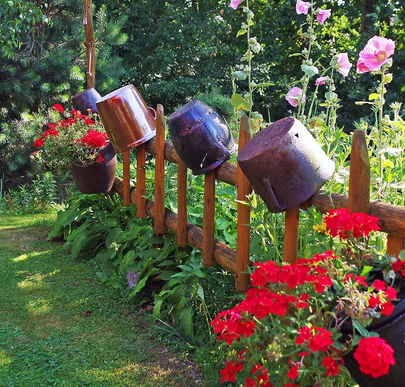 Wooden fence with hanging pots
