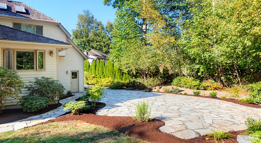 Flagstone type patio in backyard