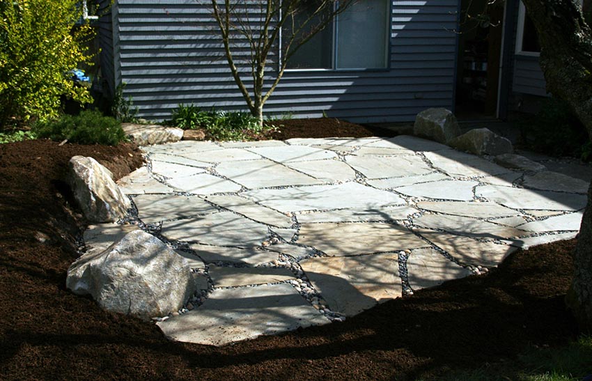 Building patio with bark border