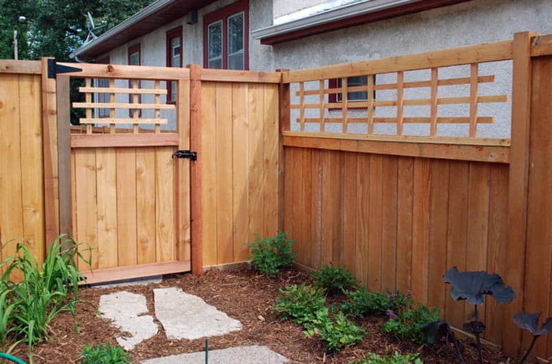 Cedar fence with gate and lattice top
