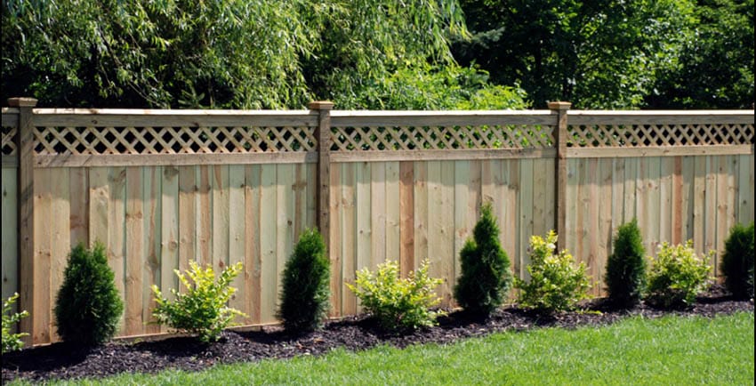 Cedar wooden fence with lattice top