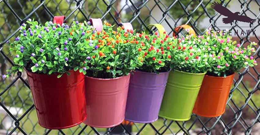 Colorful fence hanging pots