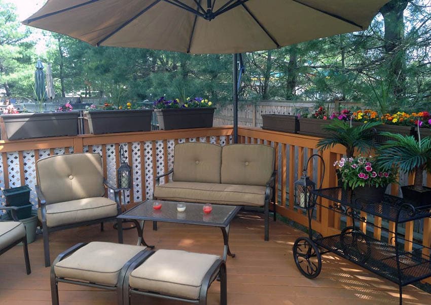 Composite deck with flower boxes on rail