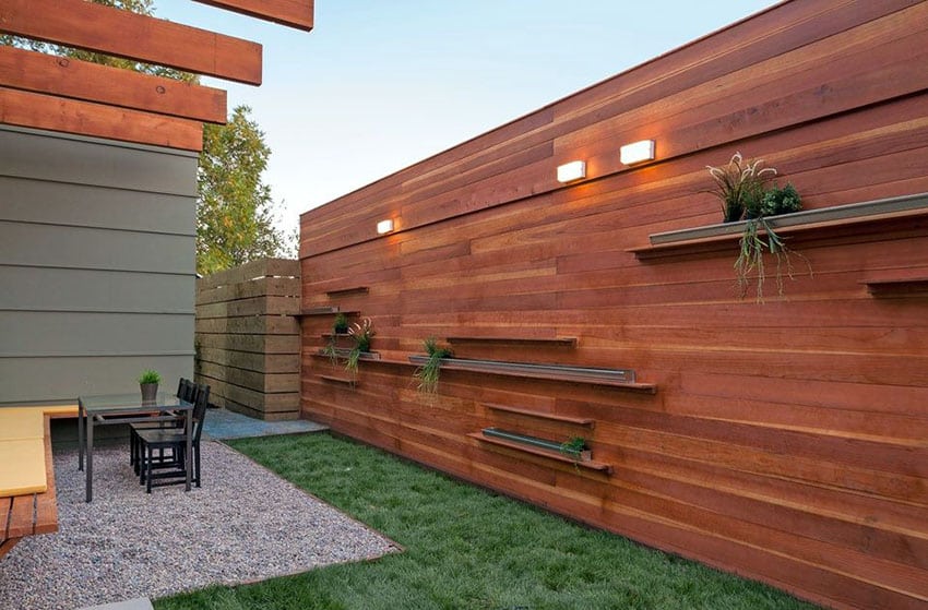 Contemporary horizontal fence with shelves for planter boxes