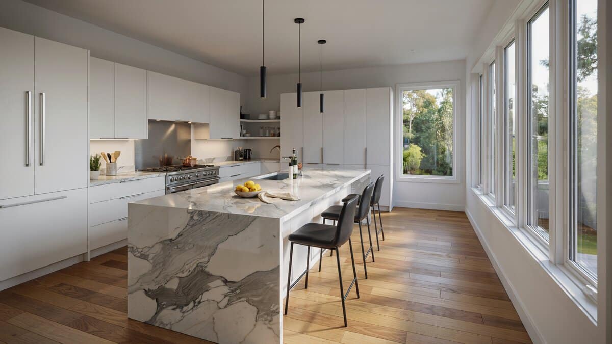 White flat panel kitchen with marble waterfall island and warm bamboo plank floors