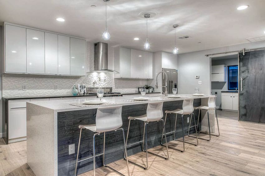 kitchen with gloss cabinets distressed wood graining island and bamboo flooring