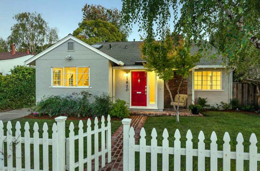 Cottage with white picket fence