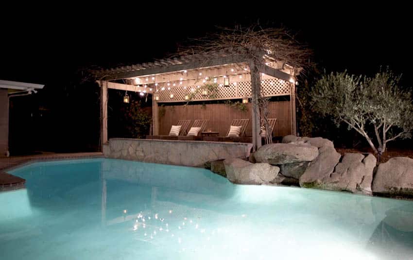 DIY pergola, lights and lattice by swimming pool