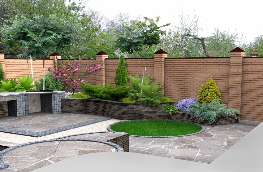 Concrete flooring made to look like flagstones with landscaped garden