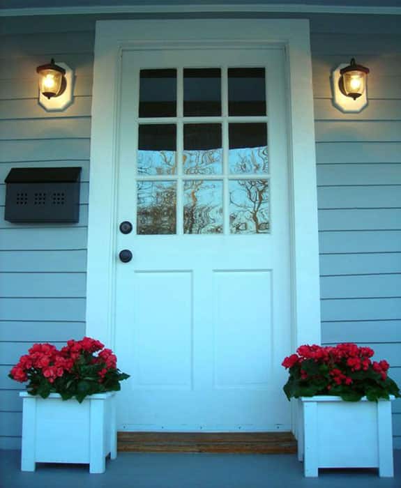 Front entrance to cottage with flower boxes