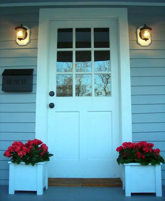 Front entrance to cottage with flower boxes
