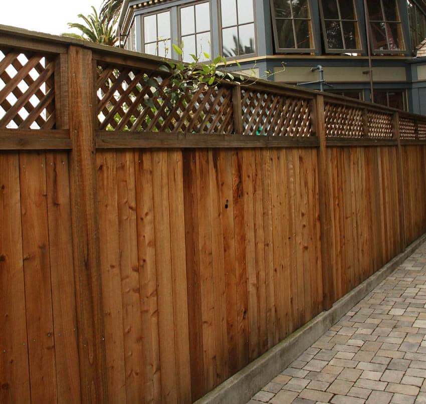 Good neighbor redwood fence with lattice top