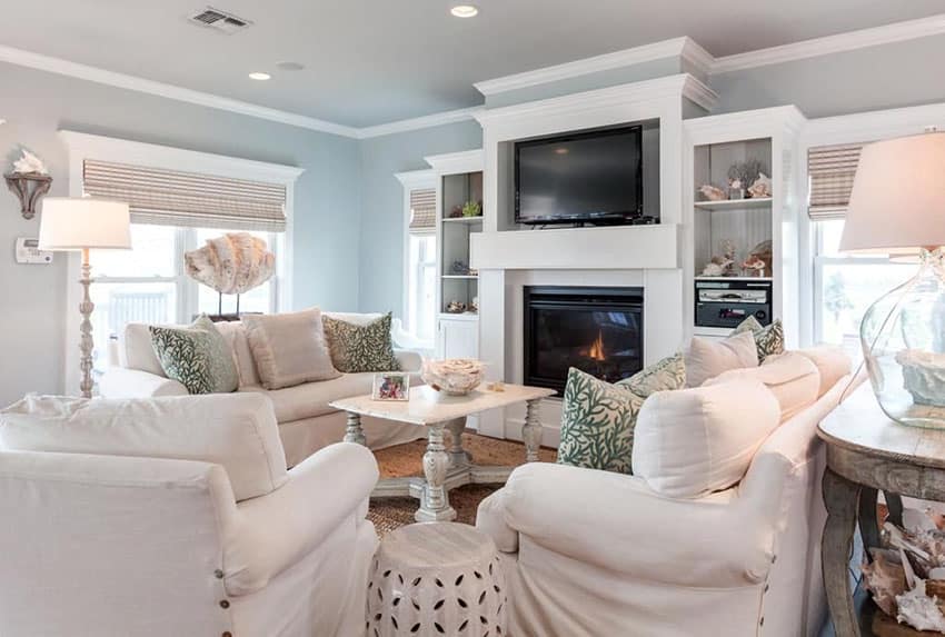 Living room with ocean decor seashells and white furniture