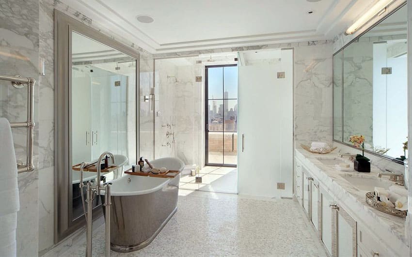 Luxury master bathroom with frameless shower and frosted glass