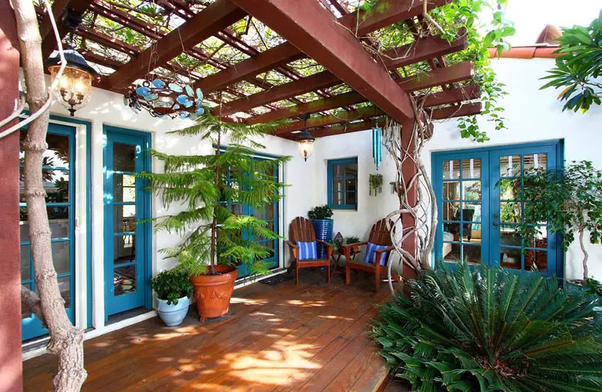 Mediterranean patio deck with covered garden pergola