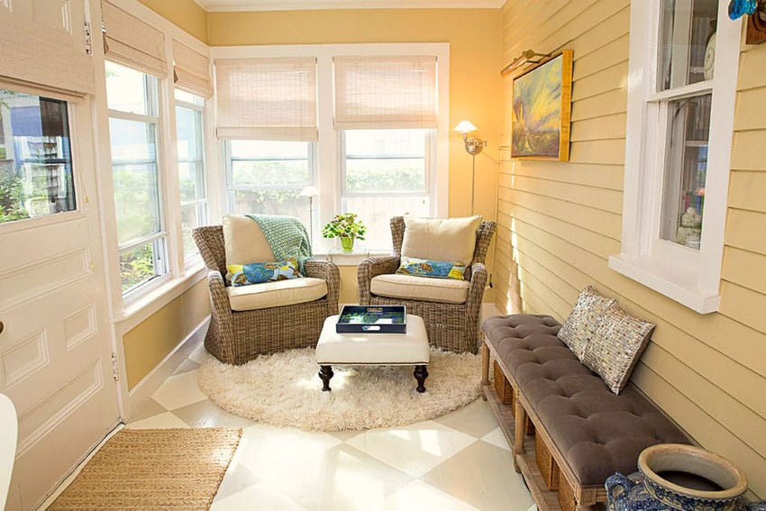 Small sunroom addition porch with yellow and white colors and cottage theme