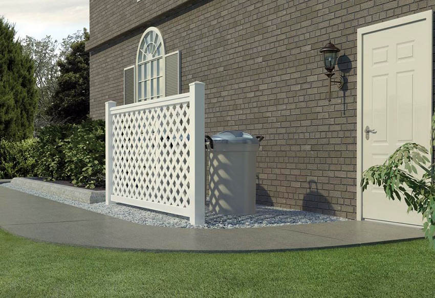 White plastic lattice fence for trash cans