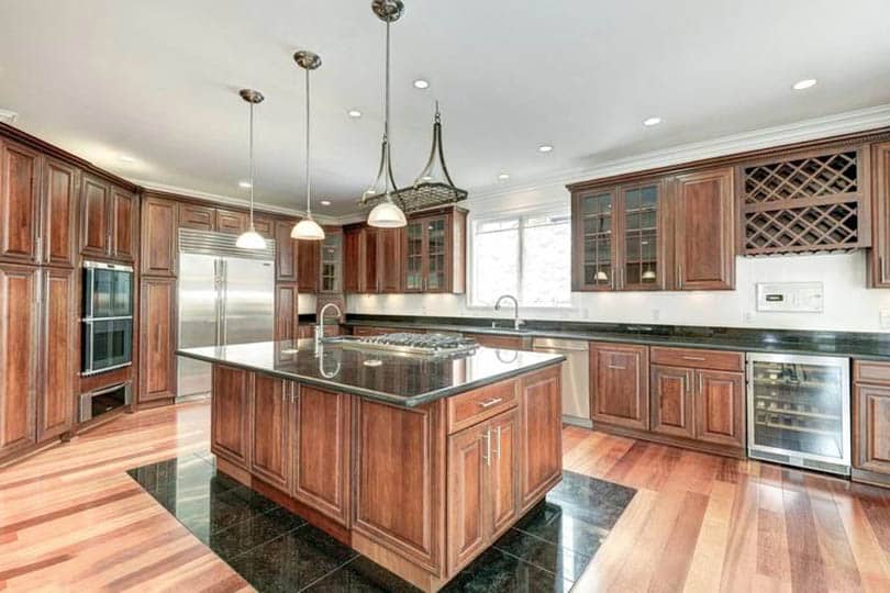 Wood kitchen with scraped hickory hardwood floors