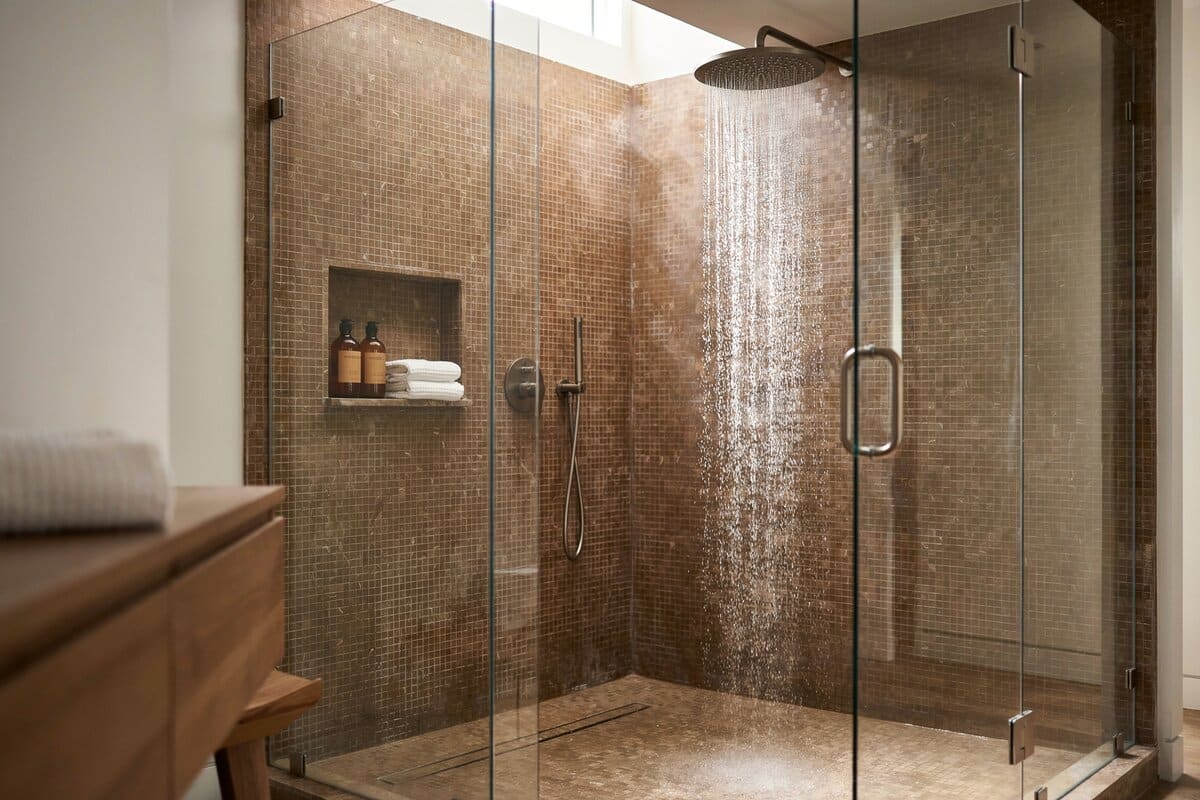 Large walk in rainfall shower with glass tile