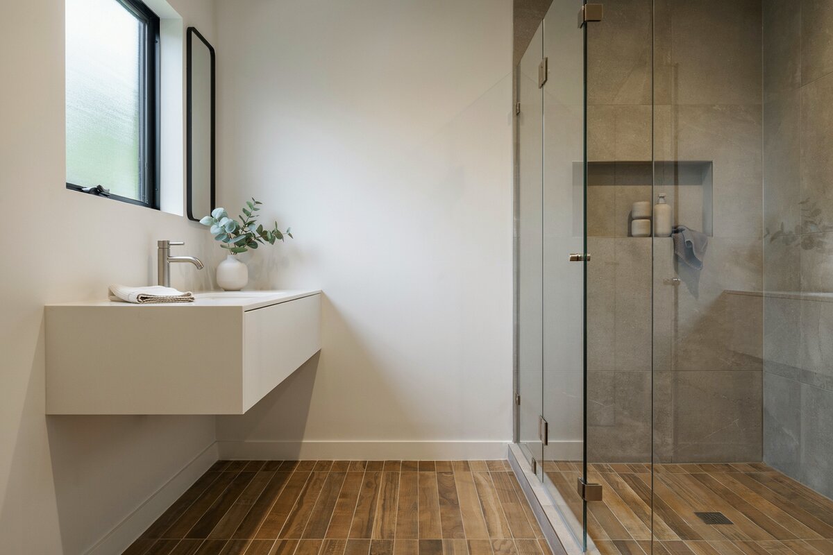 Tiles with teakwood finish with cantilevered counter and white surface