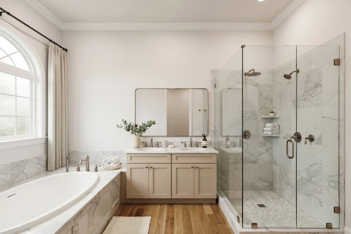 Transitional bathroom with drop-in bath tub, marble counters and crown molding