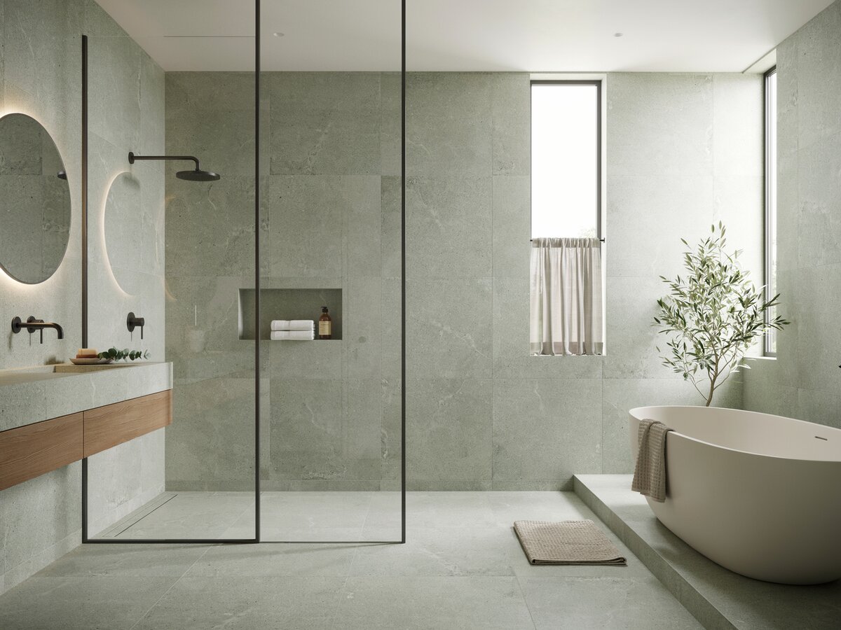 Bathroom with grey shades, granite tub with partition with stainless steel framing