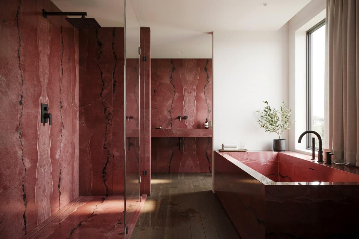 Red granite on floors and walls and fixtures in black finish