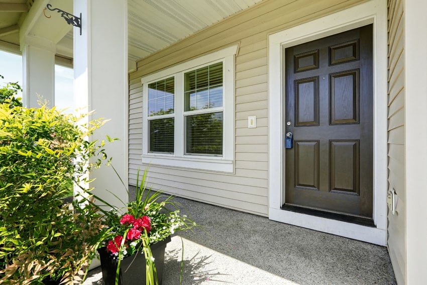 Beige house with brown door