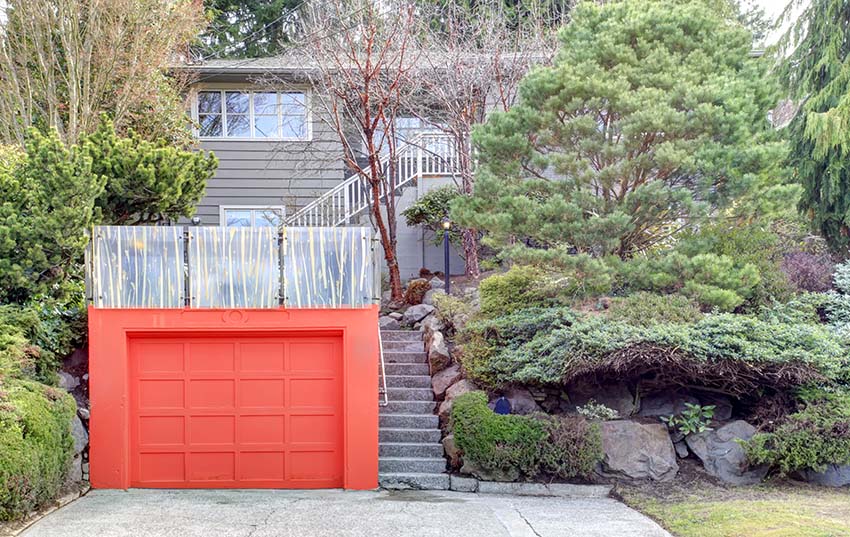 Red standalone garage of a contemporary house