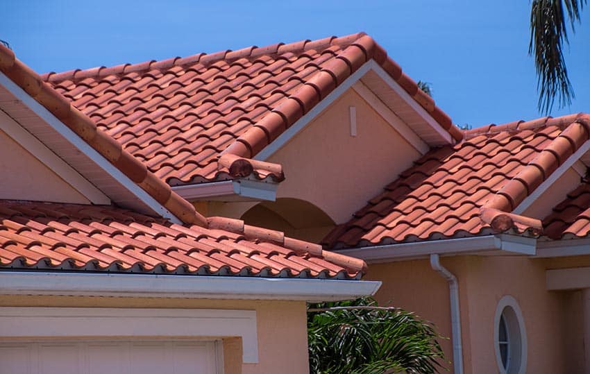 Clay spanish tile shingle roof house