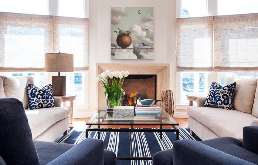 Blue and white coastal inspired space with jute shades