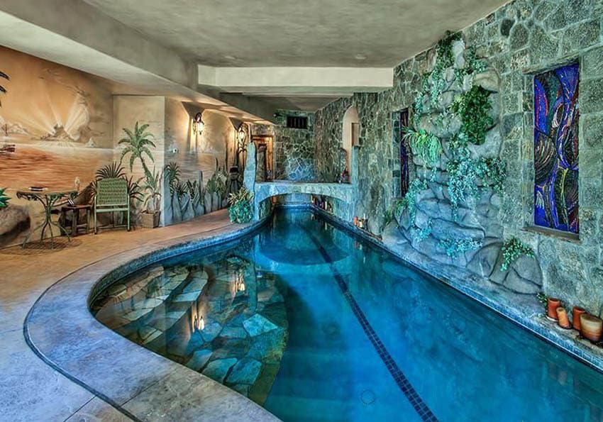 Exotic indoor swimming pool grotto style