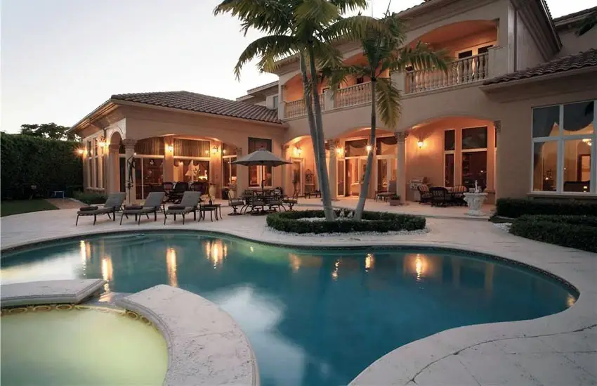 Kidney pool with hot tub at luxury home