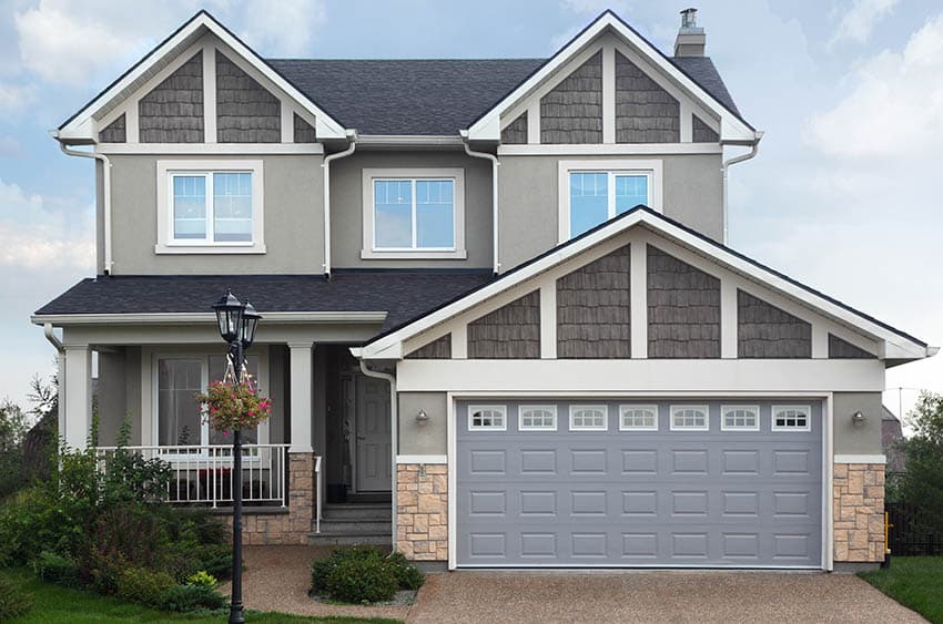 Light gray garage door house