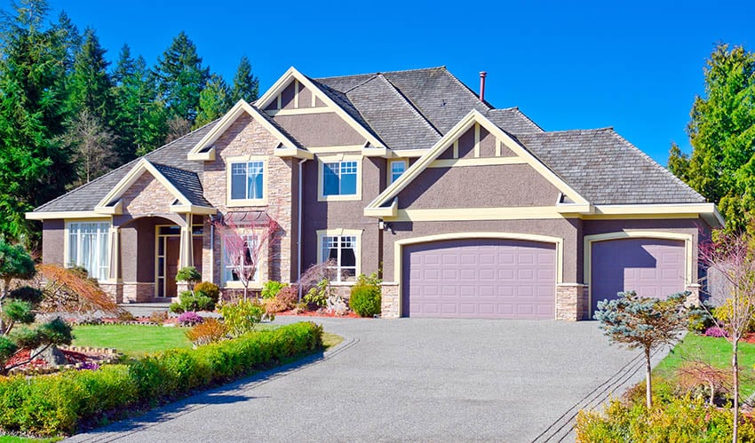 Traditional home with purple garage