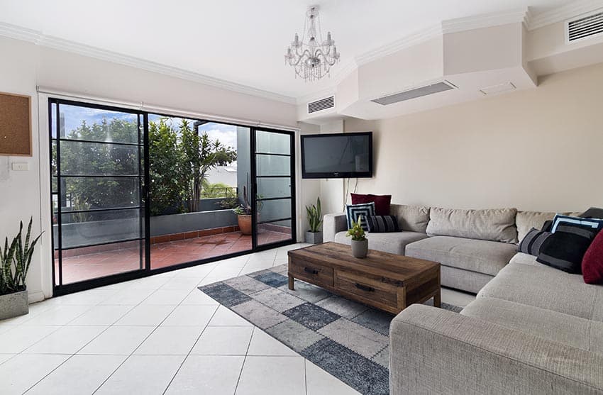 living room with tv in corner