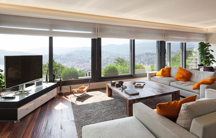 Living room with corner tv placement on entertainment center