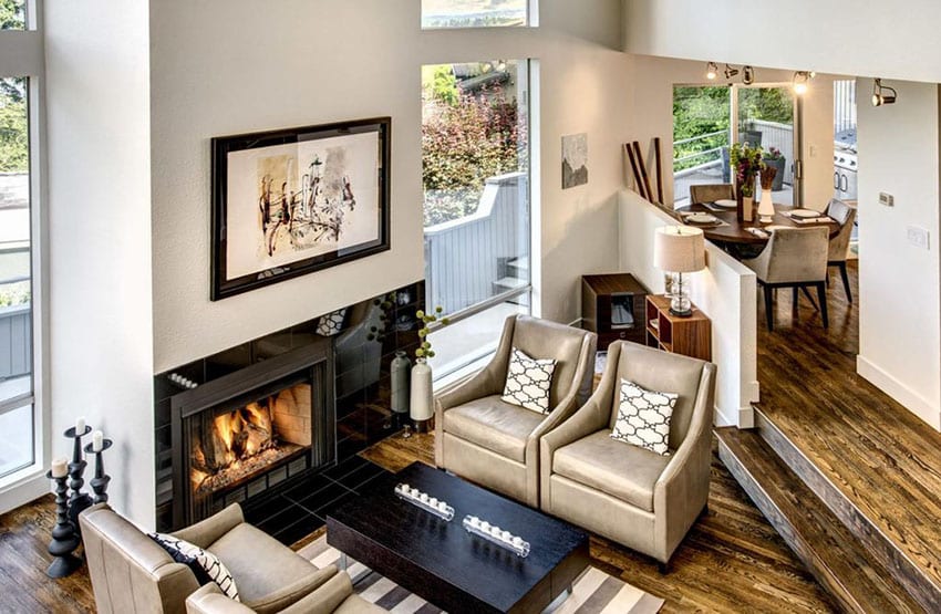 Living room with leather armchairs and fireplace