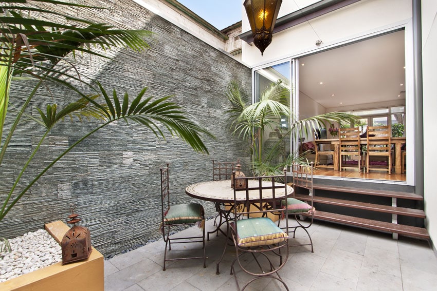 Modern patio with textured accent wall