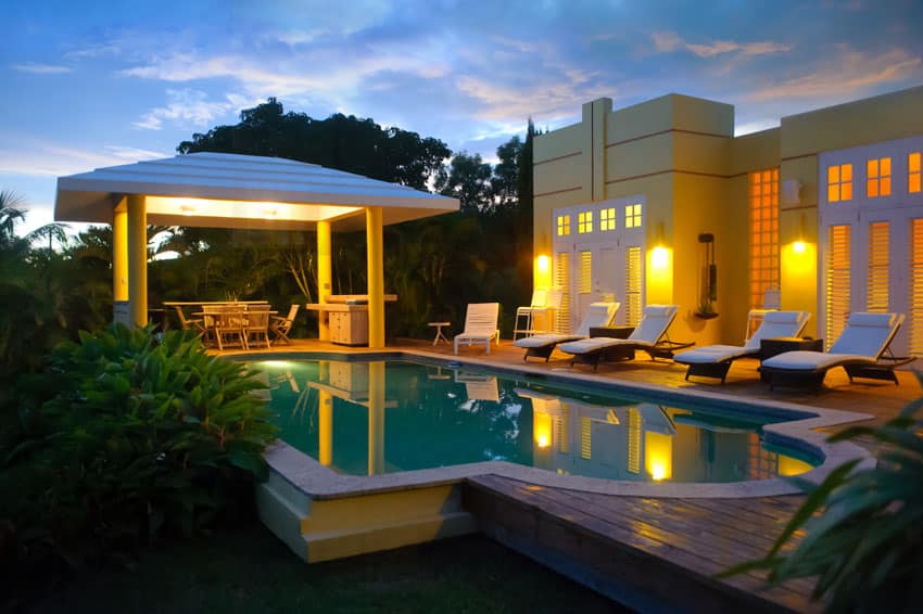 Modern swimming pool pavilion with barbecue