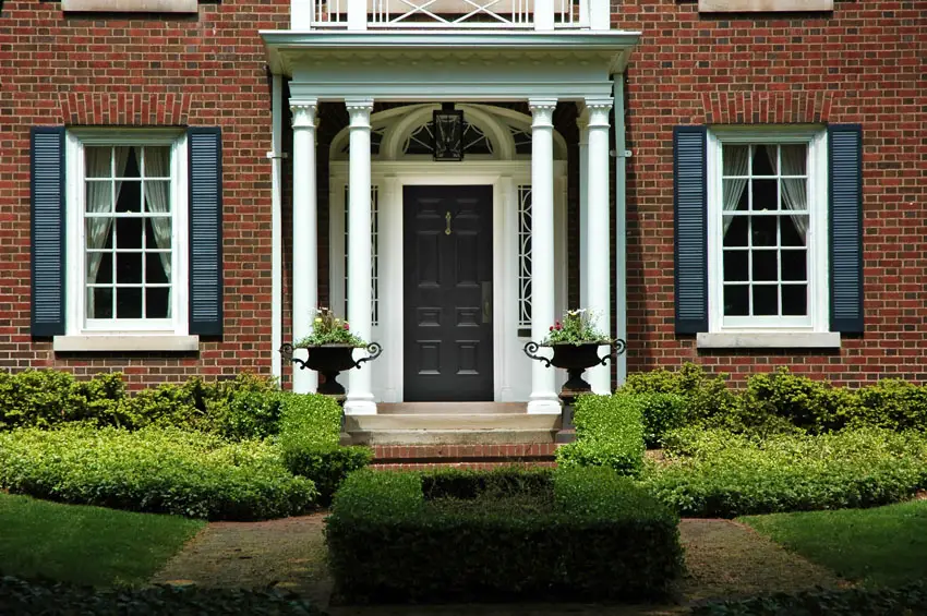 Dark door color with white trim and windows 