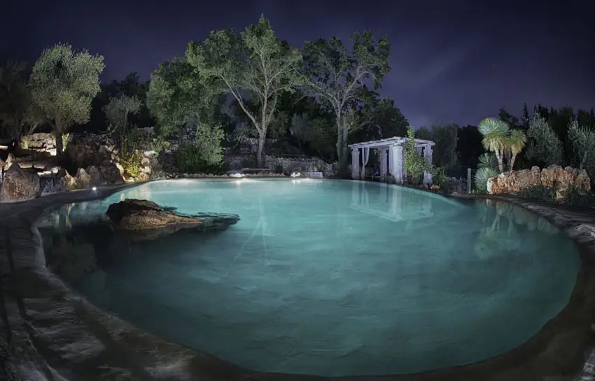 Swimming pool at night with canopy