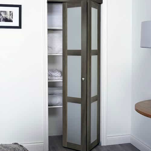 Wood bifold closet door with frosted glass