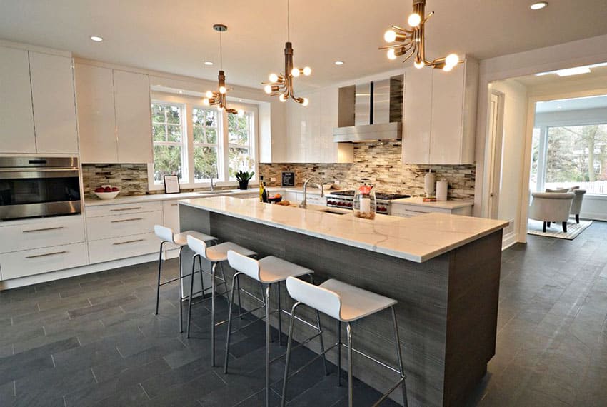 Contemporary kitchen with contrasting kitchen island in brown against white main cabinets