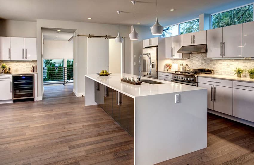 Contemporary Kitchen With Waterfall Island With Corian Countertop 