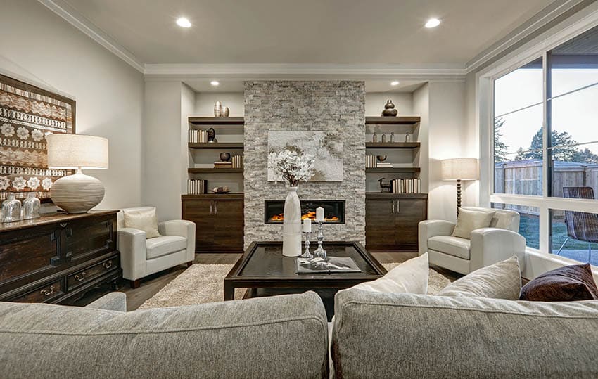 Living room with stacked stone fireplace