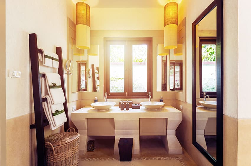 Japanese style bathroom with dual sinks and drum basket pendant lights