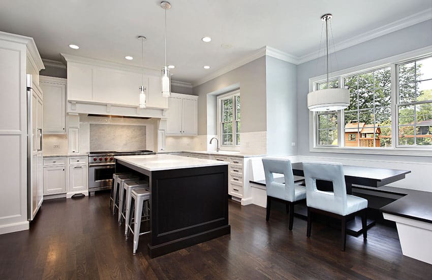 Dark Brown Honey Marble Kitchen Island Table kitchen with contrasting white main cabinets versus black island with white marble countertop