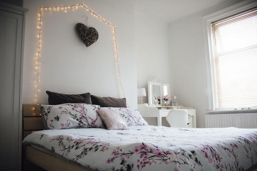 Teen girl bedroom with strand of wall lights